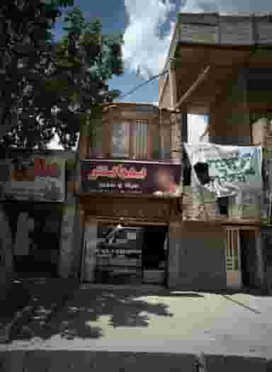 پیرایش سیاه و سفید در محله شهید قربانی مشهد 