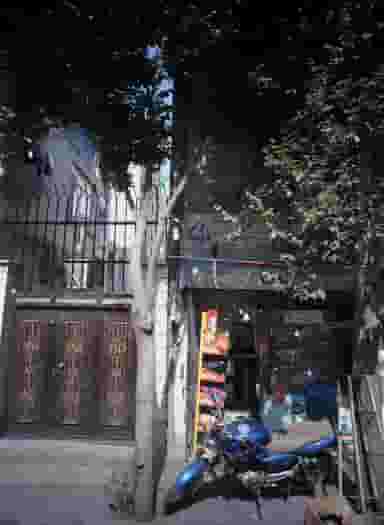 سوپرمارکت تهمتن در باغ خزانه 