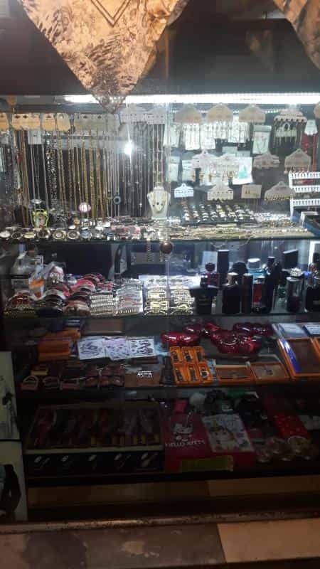 عکس فروشگاه رنگین کمان در صاحب الزمان