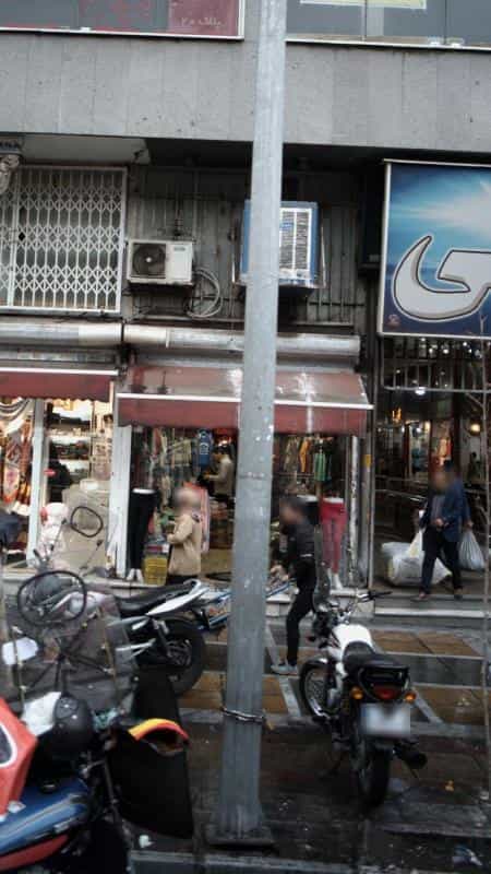 عکس فروشگاه لباس در انقلاب