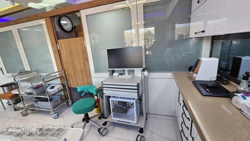 عکس مرکزدندانپزشکی وایمپلنت ودندانپزشکی زیبایی دکتر مهردادافتحی در شکوفه تهران