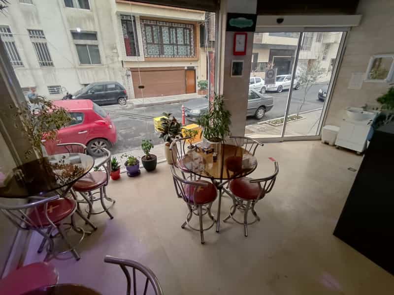 عکس پیتزا هانی در قزل قلعه تهران