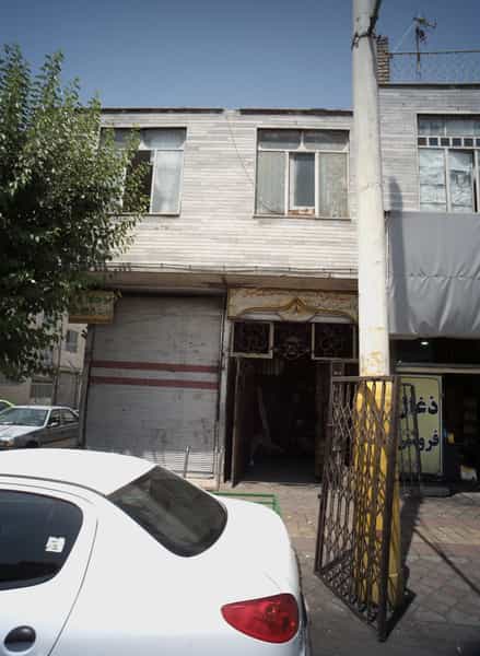 عکس کارگاه درب پنجره آهنی و اسکلت ساختمانی در مطهری تهران