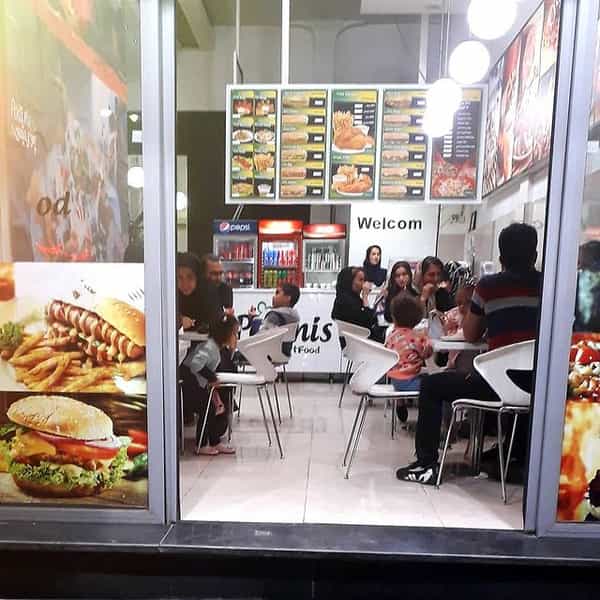 عکس فست فود پودینیس در ولیعصر جنوبی تهران