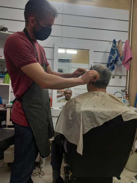 عکس پیرایش حمید در بنیاد قم