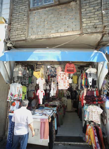 عکس فروشگاه پوشاک بچه گانه در بالا خیابان مشهد