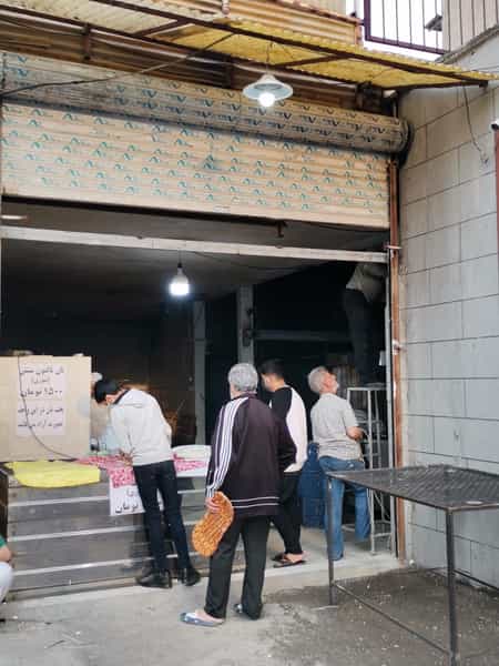 عکس نانوایی تافتون سنتی تنوری سبوس‌دار در حکیمیه تهران