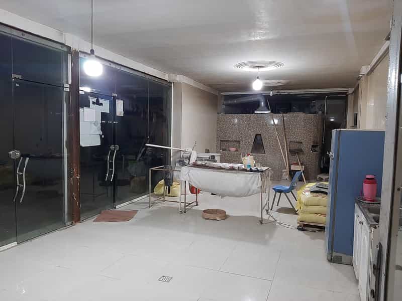 عکس سنگک پزی سنتی بابایی در پشت ناحیه ارومیه