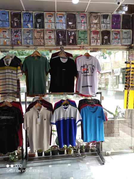 عکس فروشگاه تولید و پخش پوشاک مردانه کارون قم