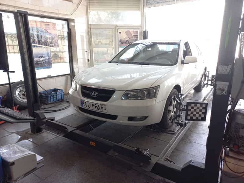 عکس تعمیرگاه جلوبندی،میزان فرمان لیزری،تعمیرگاه اتوکمک کرج