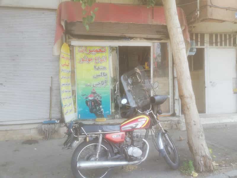 عکس تعمیرگاه موتورسیکلت در آهنگ غربی 