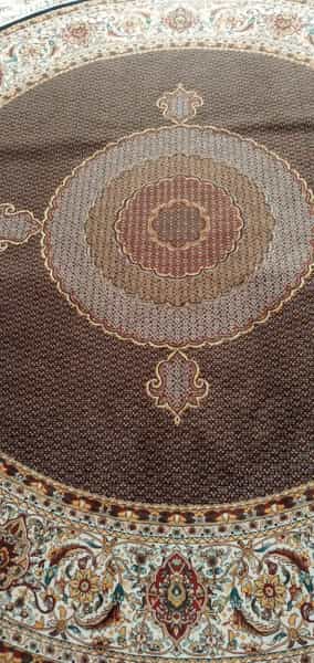 عکس قالیشویی کارگر(سولماز) در فرودگاه تبریز