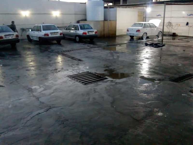 عکس کارواش بزرگ بارش در شهر خمینی‌شهر