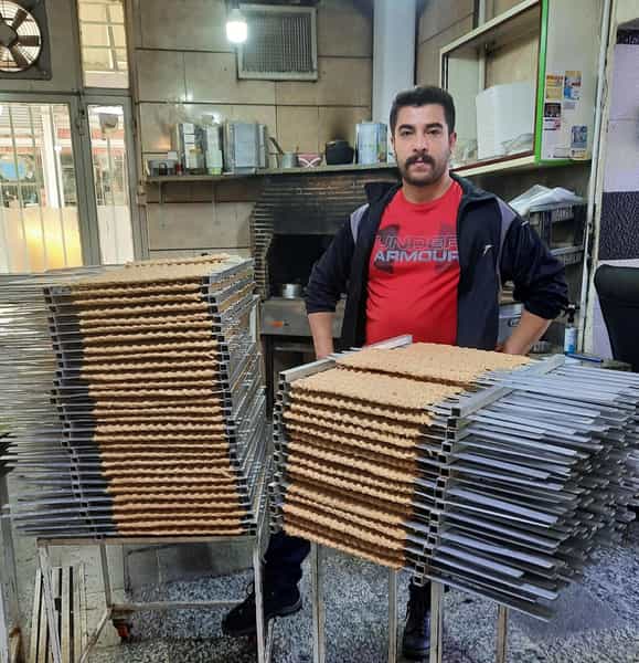 عکس تهیه غذای امین در خضر همدان