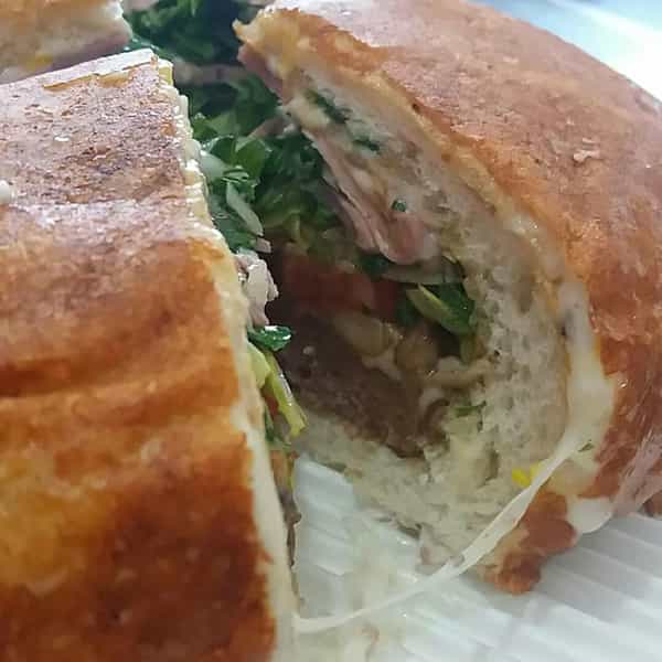 عکس پیتزا ساندویچی رنگین سفره در حافظ ارومیه