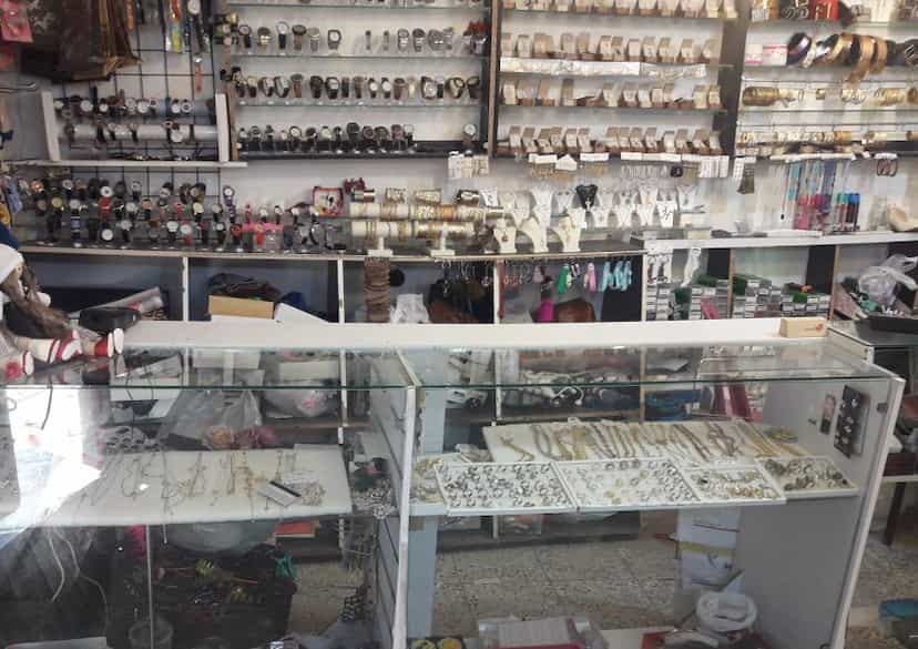 عکس کیف،کفش بدلیجات و ساعت عباس آبادی در شهر کرمانشاه