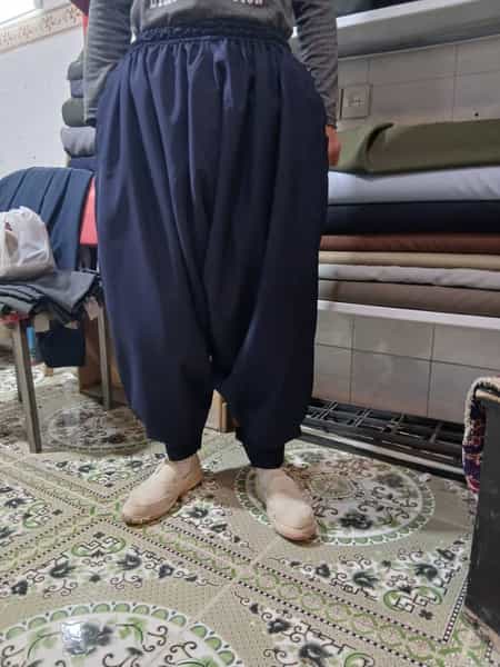 عکس خیاطی اسماعیل علیزاده در جمخانه کرمانشاه