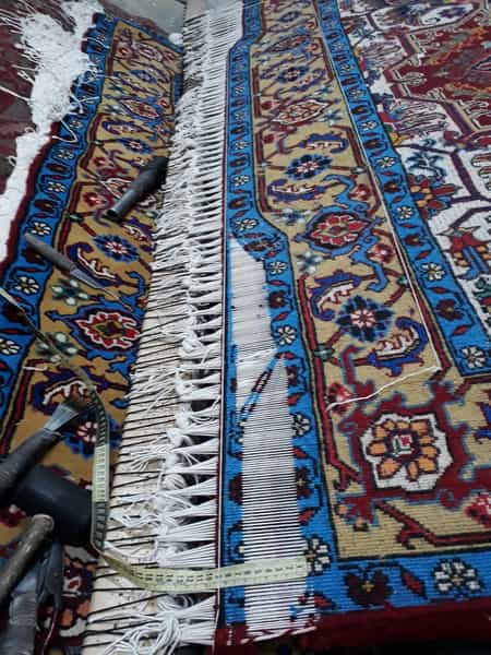 عکس دفه زنی و رفو گری و تعمیر انواع فرش در رهلی بازار تبریز