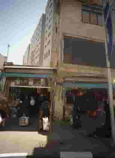 فروشگاه کیف در پایین خیابان مشهد